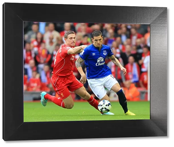 Intense Rivalry: Henderson vs. Besic - Liverpool vs. Everton, Premier League Showdown