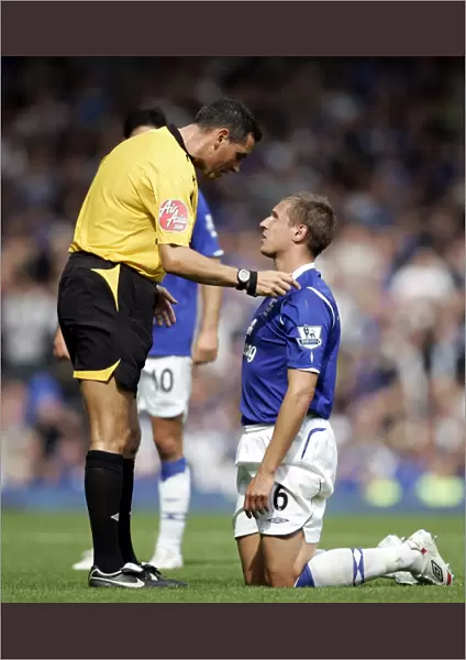 Referee Andre Marriner Confers with Everton's Phil Jagielka during Everton vs Blackburn Rovers, Barclays Premier League (2008)