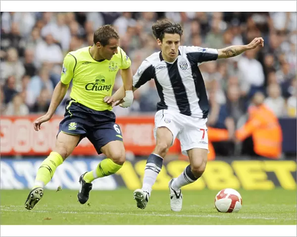 Phil Jagielka vs. Robert Koren: Everton vs. West Bromwich Albion in Barclays Premier League, 2008 - Intense Rivalry on The Hawthorns Field