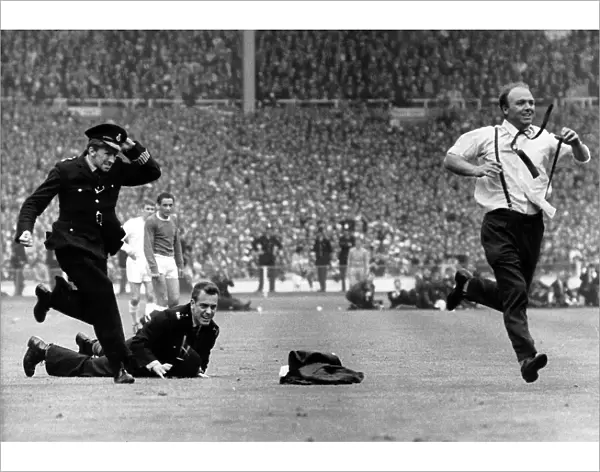 The Great Pitch Invasion: A Fan's Escape at the 1966 FA Cup Final - Everton vs. Sheffield Wednesday
