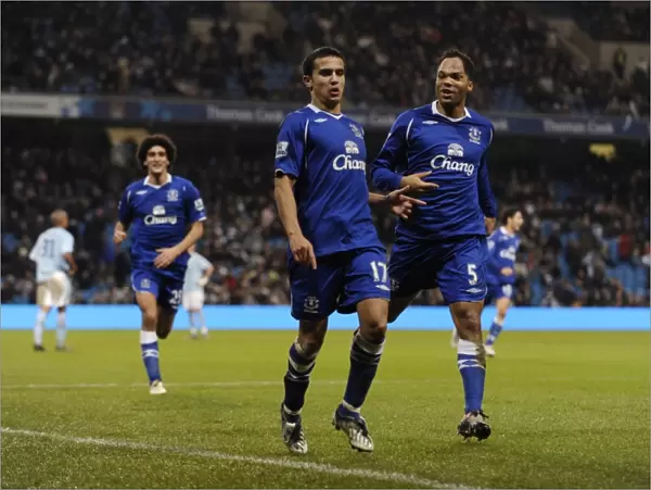 Euphoria Unleashed: Tim Cahill's Iconic Goal Celebration - Everton's Historic First Against Manchester City (08 / 09)