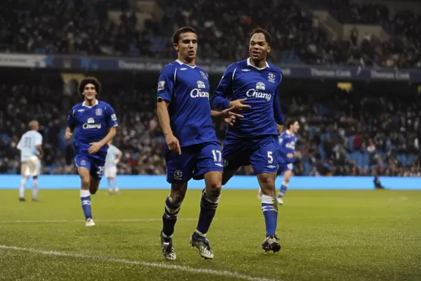 Euphoria Unleashed: Tim Cahill's Iconic Goal Celebration - Everton's Historic First Against Manchester City (08 / 09)