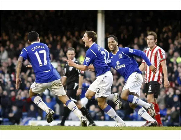 Everton's Triumph: Gosling, Lescott, and Cahill's Celebration of the Third Goal vs. Sunderland (December 28, 2008)