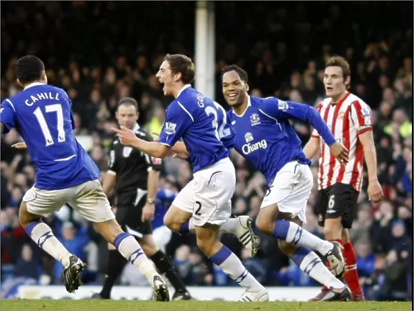Everton's Triumph: Gosling, Lescott, and Cahill's Celebration of the Third Goal vs. Sunderland (December 28, 2008)