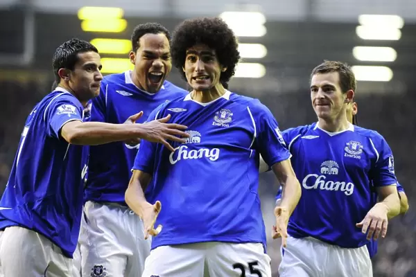 Everton's Fellaini Scores First Goal, Celebrated by Cahill, Lescott, and Baines (01.10.09)