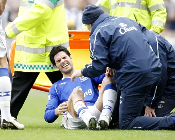 Mikel Arteta Suffers Injury: Everton's Star Midfielder Carried Off in Newcastle Clash, Barclays Premier League (2009)