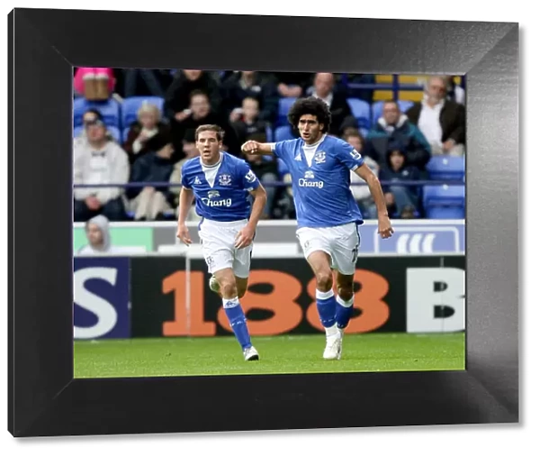 Marouane Fellaini's Double: Everton's Celebration Against Bolton Wanderers in the Premier League