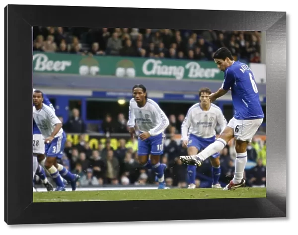 Evertons Arteta scores a penalty against Chelsea during their English Premier League match in Liver