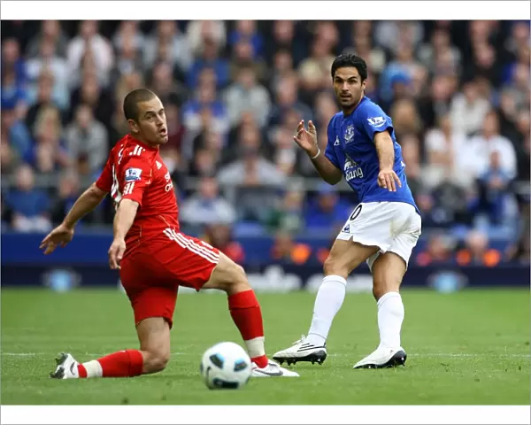 Mikel Arteta vs. Joe Cole: A Football Rivalry Unfolds at Goodison Park - Everton vs. Liverpool, Barclays Premier League