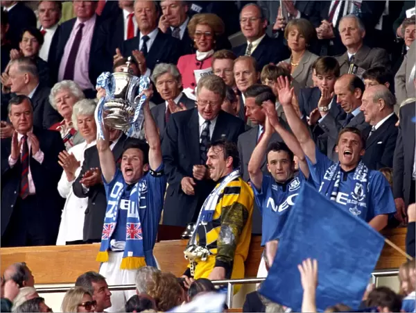 Everton's Glory: FA Cup Victory over Manchester United (1995) - Dave Watson Lifts the Trophy
