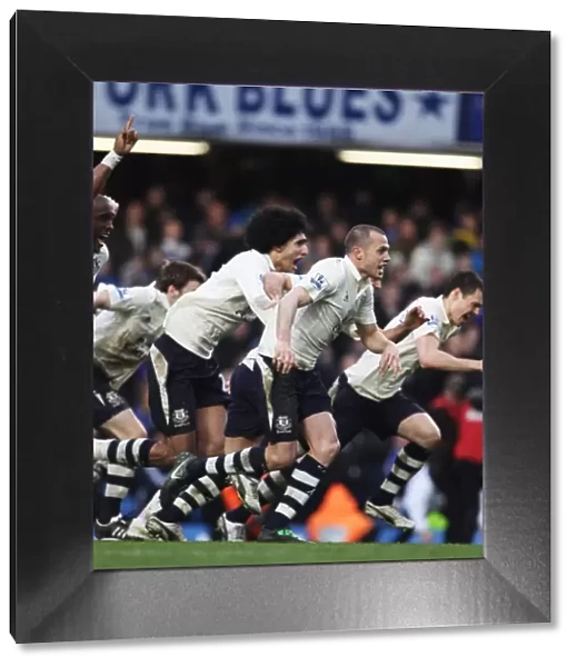 Everton's Glory: Fellaini and Heitinga Celebrate FA Cup Penalty Victory over Chelsea (February 19, 2011)
