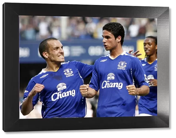 Everton's Mikel Arteta and Leon Osman: A Celebration of Goalscoring Glory (vs Portsmouth)