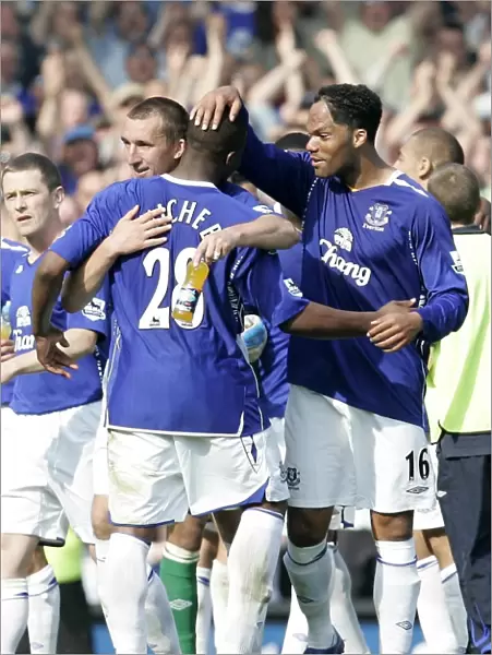 Everton's Joleon Lescott Leads the Celebration: Everton's Victory Over Portsmouth in FA Barclays Premiership (5 / 5 / 07)