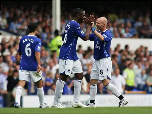 Everton's Double Act: Johnson and Anichebe Celebrate Second Goal vs. Wigan Athletic (August 11, 2007)