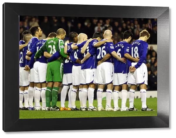 Everton Players Honor the Silence: A Moment of Respect at Goodison Park during Everton vs Chelsea Carling Cup Semi-Final, 07 / 08