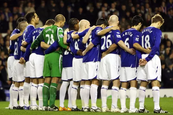 Everton Players Honor the Silence: A Moment of Respect at Goodison Park during Everton vs Chelsea Carling Cup Semi-Final, 07 / 08