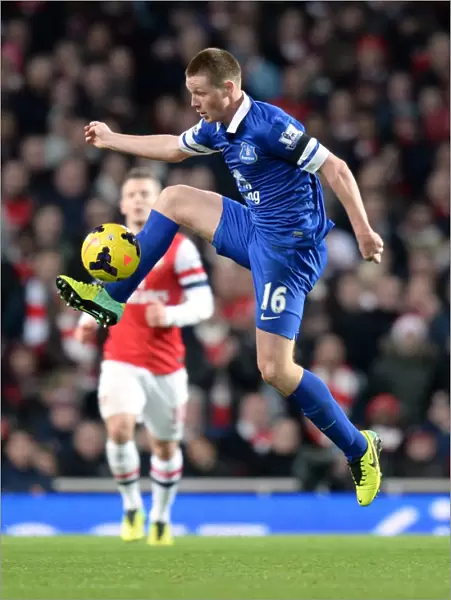 James McCarthy vs Arsenal: Intense Face-Off at Emirates Stadium in Everton's 1-1 Barclays Premier League Battle (December 8, 2013)