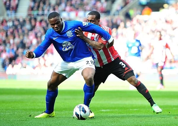 Battle for the Ball: Anichebe vs. Rose - Premier League Rivalry at Stadium of Light (April 2013)