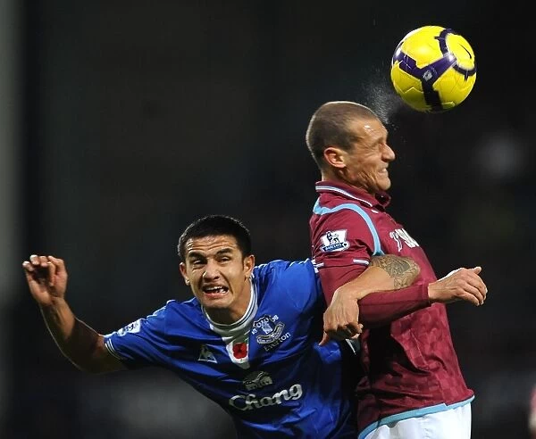 Battle for the Ball: Diamanti vs. Cahill - Premier League Clash between West Ham and Everton