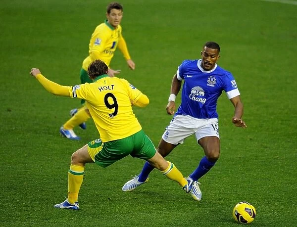 Battle for the Ball: Everton vs. Norwich City Rivalry at Goodison Park