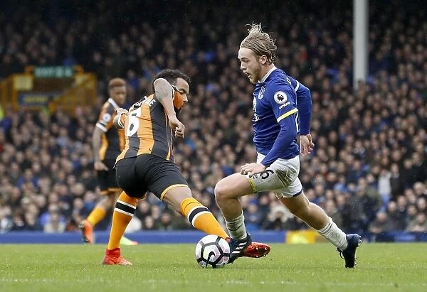 Battle for the Ball: A Head-to-Head Clash between Everton's Tom Davies and Hull City's Tom Huddlestone