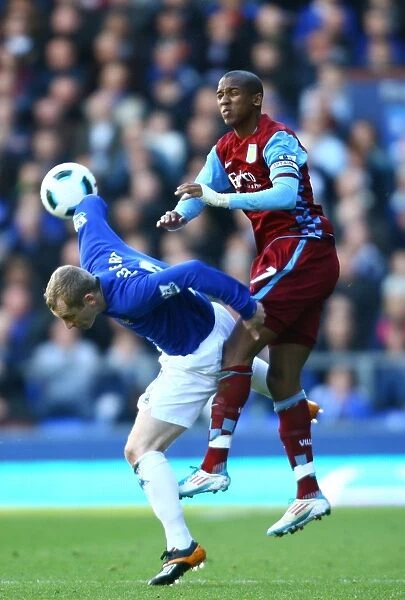 Battle for the Ball: Hibbert vs. Young at Goodison Park - Everton vs. Aston Villa, Premier League (2011)
