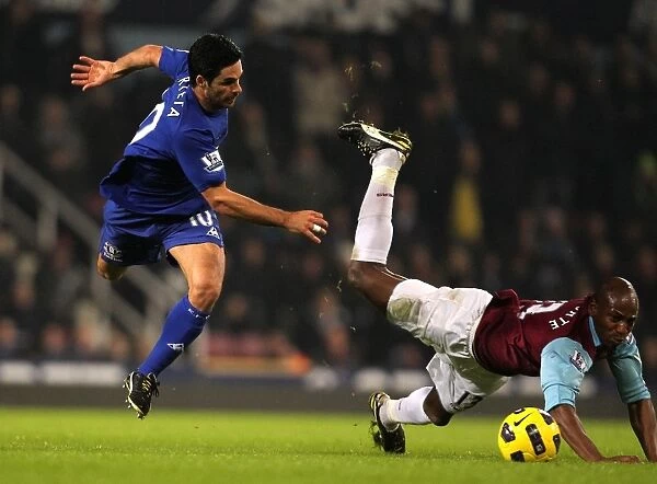 Battle for the Ball: Mikel Arteta vs. Luis Boa Morte - West Ham United vs. Everton, Premier League Rivalry (Upton Park, 2010)
