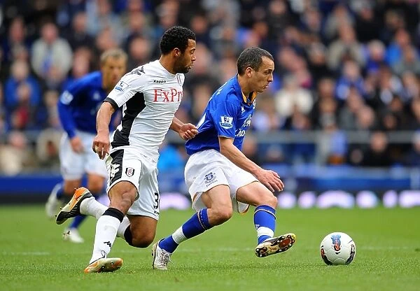 Battle for the Ball: Osman vs. Dembele - Everton vs. Fulham, Premier League Rivalry (2012)