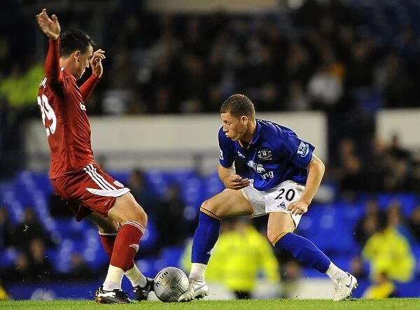 Battling for Control: Ross Barkley vs. George Thorne - Everton vs. West Bromwich Albion in the Carling Cup Third Round