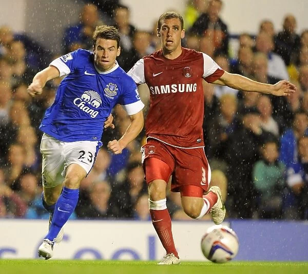 Battling for Control: Seamus Coleman vs. Gary Sawyer - Everton's Dominance over Leyton Orient in the Capital One Cup