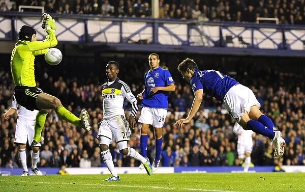 Clash at Goodison: Bilyaletdinov's Header Thwarted by Cech in Carling Cup Battle (Everton vs Chelsea, 26 October 2011)