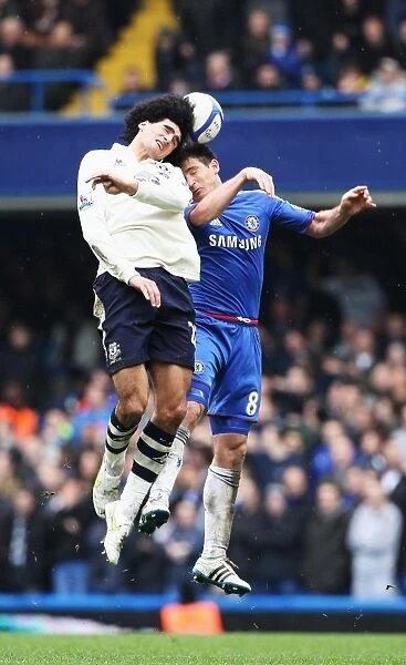 Clash at Stamford Bridge: A Headed Battle - Frank Lampard vs. Marouane Fellaini, FA Cup Fourth Round Replay Showdown