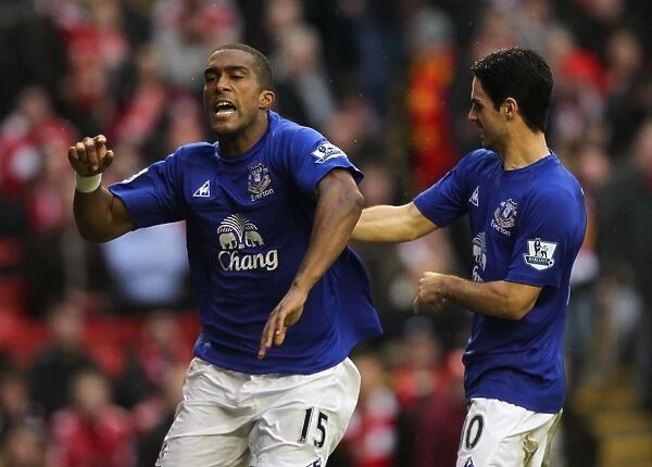 Dramatic Equalizer: Distin and Arteta Celebrate for Everton at Anfield (16 January 2011)
