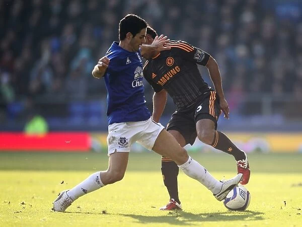 Epic FA Cup Showdown: Mikel Arteta vs. Florent Malouda - Football Rivals Clash at Goodison Park (2011 Everton vs. Chelsea)