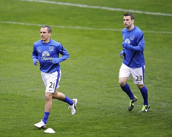 Everton FC: Osman and Coleman Warming Up Ahead of Everton vs. QPR (13-04-2013)