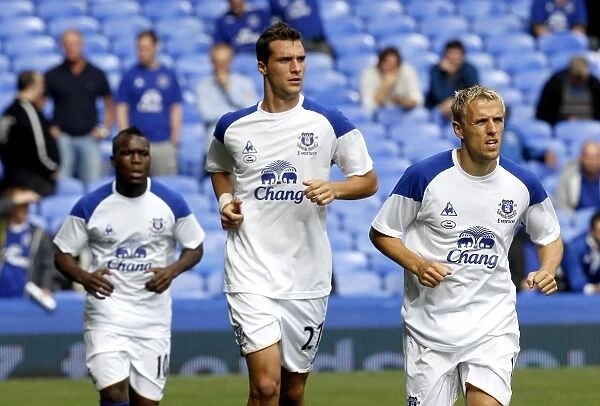 Everton FC: Pre-Match Training - Royston Drenthe, Apostolos Vellios, and Phil Neville at Goodison Park