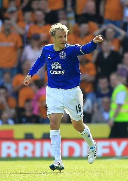 Everton's Double Victory: Phil Neville's Goal Secures Premier League Win Against Wolverhampton Wanderers (09 April 2011)