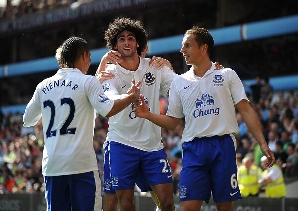 Everton's Fellaini Scores Second Goal: Team Celebrates at Villa Park (25-08-2012)