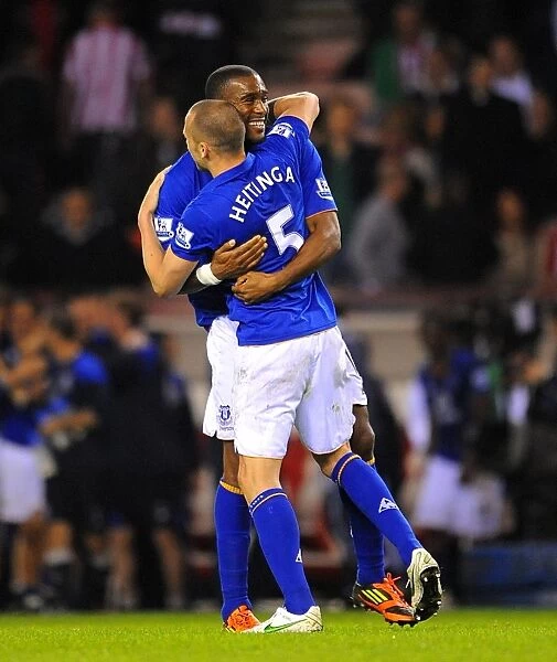Everton's Glory: Heitinga and Distin Celebrate FA Cup Victory Over Sunderland (March 27, 2012)