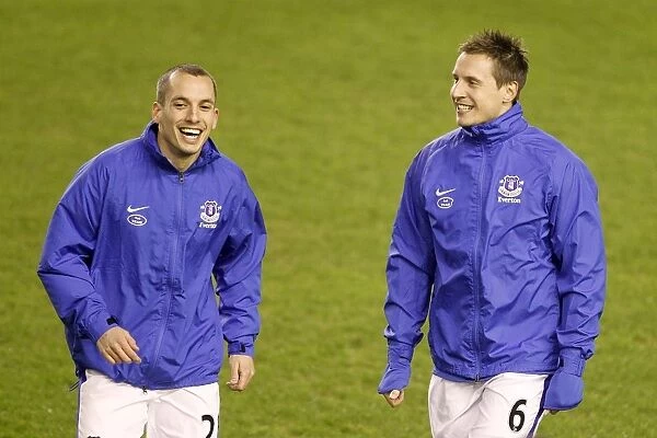 Everton's Osman and Jagielka: A Light-Hearted Moment Before Securing a 2-1 Victory Over West Bromwich Albion (BPL, Goodison Park, 30-01-2013)
