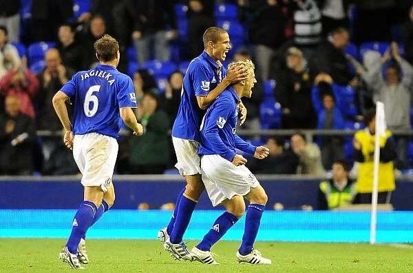 Everton's Phil Neville and Jack Rodwell Celebrate Second Goal in Carling Cup Round 3 (September 21, 2011)