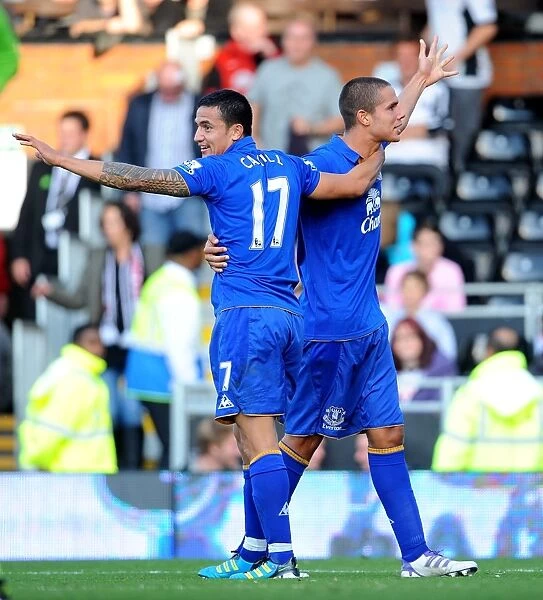 Everton's Rodwell and Cahill: Celebrating a Triumphant Third Goal Against Fulham (October 2011)