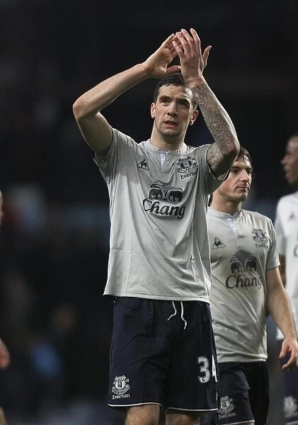 Everton's Shane Duffy in Action: Premier League Rivalry vs. Aston Villa (14 January 2012)