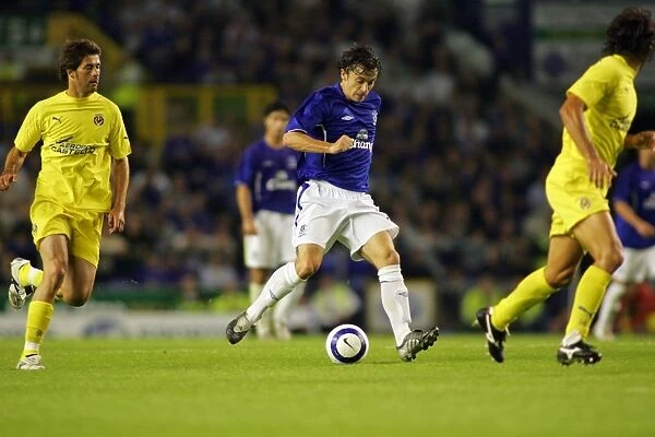 Everton's Simon Davies Goes Head-to-Head: Everton FC vs Villarreal - The Intense Midfield Battle