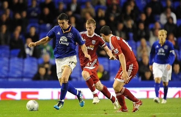 Everton's Stracqualursi Slips Past West Brom Defenders in Carling Cup Showdown