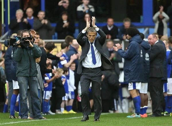 Everton's Triumphant Moment: Phil Neville Honored with Guard of Honor after Securing Victory over West Ham United (2-0, Barclays Premier League, Goodison Park, May 12, 2013)