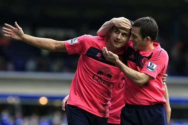 Everton's Unforgettable Moment: Tim Cahill and Leighton Baines Celebrate the Toffees Second Goal vs. Birmingham City