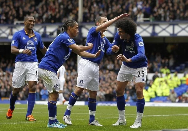 Everton's Unstoppable Teamwork: Fellaini and Pienaar's Unforgettable Goal Celebration (April 2012, Goodison Park)