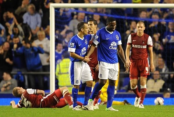 Everton's Victor Anichebe and Leon Osman: Celebrating a Brilliant Team Goal in Everton's 5-0 Capital One Cup Win over Leyton Orient (2012)
