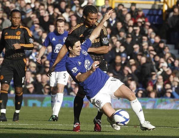 The FA Cup Battle: Arteta vs. Malouda at Goodison Park (Everton vs. Chelsea, 2011)